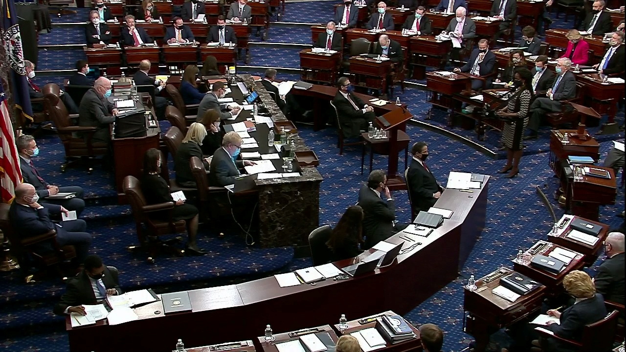 The U.S. Senate votes on the rules to govern the trial as it begins the second impeachment trial of former U.S. President Donald Trump, on charges of inciting the deadly attack on the U.S. Capitol, on the floor of the Senate chamber on Capitol Hill in Washington, U.S., February 9, 2021. U.S. Senate TV/Handout via Reuters