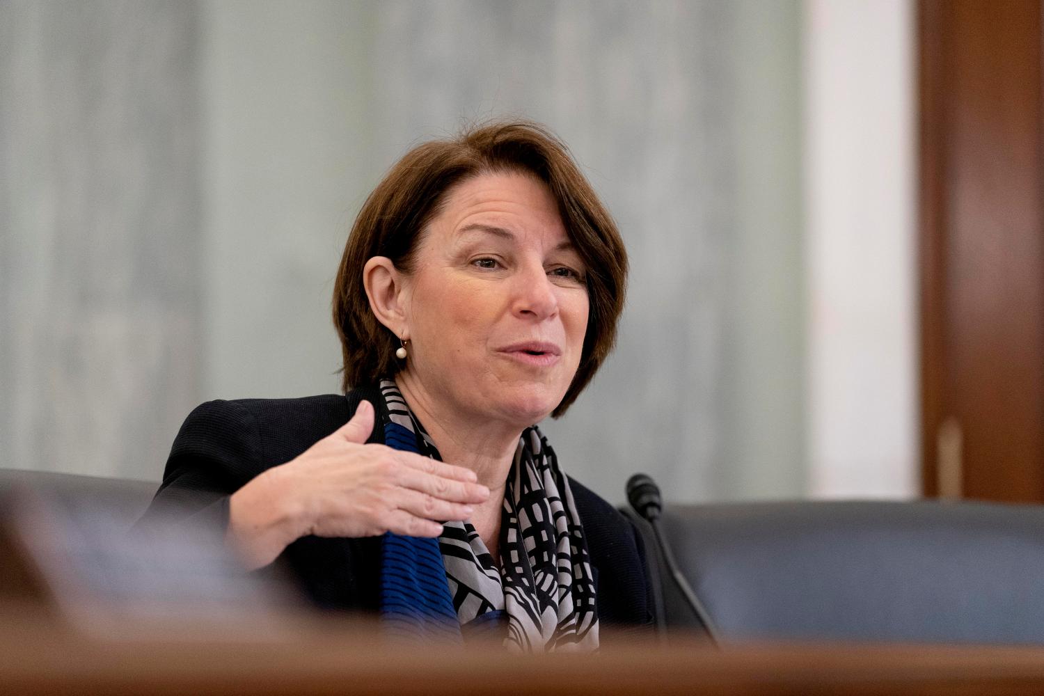 FILE PHOTO: U.S. Senator Amy Klobuchar (D-MN) speaks during a Senate Commerce, Science, and Transportation Subcommittee hearingon Capitol Hill in Washington, D.C., U.S., December 10, 2020. Andrew Harnik/Pool via REUTERS/File Photo