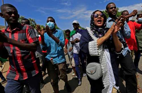 Sudanese protesters march in a demonstration to mark the anniversary of a transitional power-sharing deal with demands for quicker political reforms in Khartoum, Sudan August 17, 2020. REUTERS/Mohamed Nureldin Abdallah