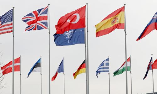 Flags of NATO member countries flutter at the Alliance headquarters in Brussels, Belgium, February 28, 2020.  REUTERS/Francois Lenoir