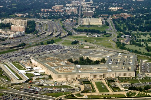 Photo: Aerial of the Pentagon, the Department of Defense headquarters in Arlington, Virginia, near Washington DC, with I-395 freeway on the left, and the Air Force Memorial up middle.