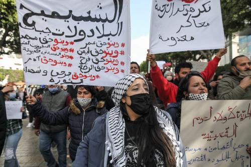 Female protesters holds placards and shout anti-government slogans as they took part in demonstration held in the capital Tunis, to call for the fall of the regime and to protest against the 'police violence' used during the latest nightly protests that broke in the country. They called for the release of the young protesters arrested by the police.Protesters chanted slogans, some of them had marked the uprising against the authoritarian regime of the former Tunisian President Zine el-Abidine Ben Ali during the Tunisian revolution. The demonstration took place under the slogan: "National march against the return of the police state and Ennahdha's militias". Tunisia, January 23, 2021.Des manifestantes tiennent des pancartes et chantent des slogans antigouvernement alors qu'elles participent a une manifestation qui s'est tenue dans la capitale Tunis, pour appeler a la chute du regime et pour protester contre la 'violence policiere' employee lors des dernieres protestations nocturnes qui ont eclate dans le pays. Ils ont demande la liberation des jeunes manifestants arretes par la police. Les manifestants ont scande des slogans dont certains avaient marque le soulevement populaire contre le regime autoritaire du dictateur et ancien president de la Tunisie, Zine el-Abidine Ben Ali pendant la revolution tunisienne. La manifestation s'est deroulee sous le slogan : "Marche nationale contre le retour de l'Etat policier et des milices d'Ennahdha". Tunisie, le 23 janvier 2021.NO USE FRANCE