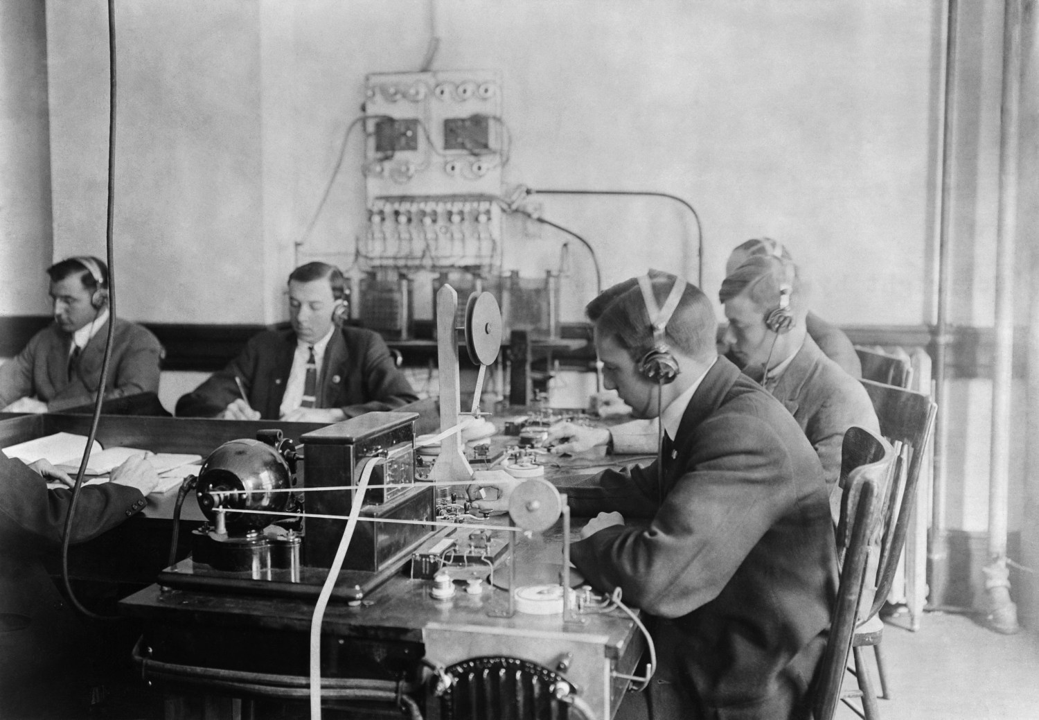Students practicing telegraphy at the Marconi wireless school in New York City. Ca. 1912.