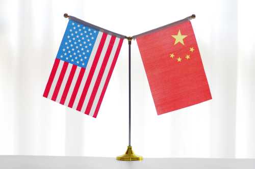 --FILE--National flags of China and the United States are seen in Ji'nan city, east China's Shandong province, 14 June 2018.Even as Chinese and American trade negotiators laid plans to maintain "intensive consultation" this month, President Donald Trump said he will impose 10% tariffs Sept. 1 on an additional $300 billion a year of imports from China. Trump disclosed the expansion of tariffs Thursday in a tweet in which he also complained that China failed to increase agricultural purchases and to cut off the flow of the opioid drug fentanyl to the U.S. from China as he said President Xi Jinping promised. Trump said the new duties will be in addition to the tariffs of as much as 25% on $250 billion a year of Chinese imports. The Dow Jones Industrial Average plunged 200 points following the news, erasing a gain of 300 points earlier in the day. China didn't immediately respond to Trump's tweet, which he concluded by writing, "We look forward to continuing our positive dialogue with China."No Use China. No Use France.