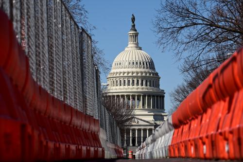 The U.S. Capitol is seen behind security fencing in Washington, U.S. March 7, 2021. REUTERS/Erin Scott