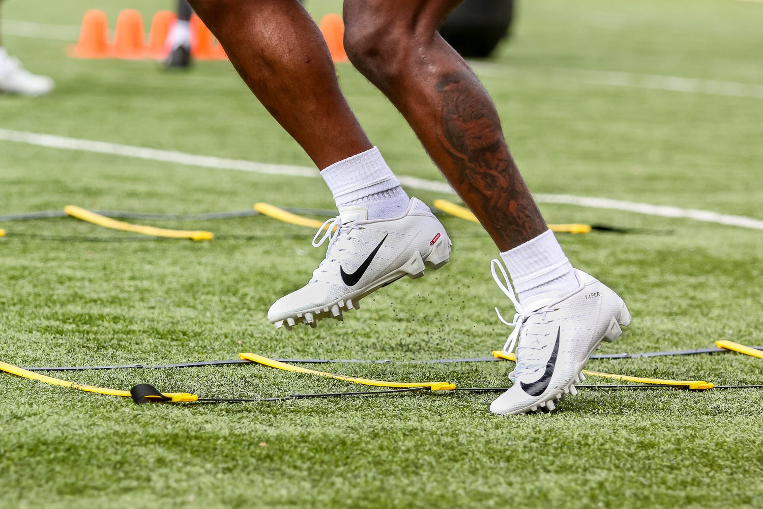 Ohio State running back Trey Sermon makes his way through agility ladder drills at EXOS in Gulf Breeze, Fla., near Pensacola, on Tuesday, March 9, 2021, while training for the NFL draft.