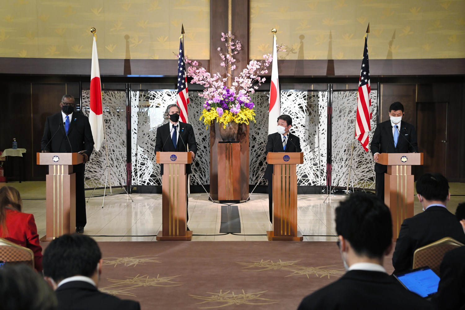 (L-R) US Defense Secretary Lloyd Austin (Lloyd James Austin III), US Secretary of State Antony Blinken (Antony John Blinken), Japanese Minister for Foreign Affairs Toshimitsu Motegi and Japan’s Defense Minister Nobuo Kishi attend a joint press conference after US - Japan Security Consultative Committee at Iikura Guest House in Tokyo on March 16, 2021. All of them wear face masks amid a pandemic of the new coronavirus COVID-19.   ( The Yomiuri Shimbun )