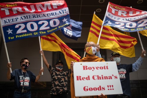 Vietnamese-American activists against the Chinese Communist Party protest outside of China’s Consulate before its closure in Houston, Texas, U.S., July 24, 2020. REUTERS/Adrees Latif