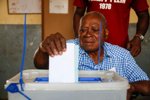 A man casts his ballot at a polling station during the legislative election in Abidjan, Ivory Coast March 6, 2021. REUTERS/Macline Hien