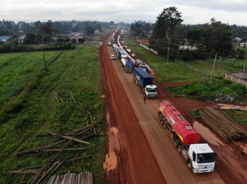 Parked trucks wait in a 10km queue, to cross the Kenyan-Ugandan border from the town of Busia, Kenya November 14, 2020. Picture taken November 14, 2020. REUTERS/Baz Ratner