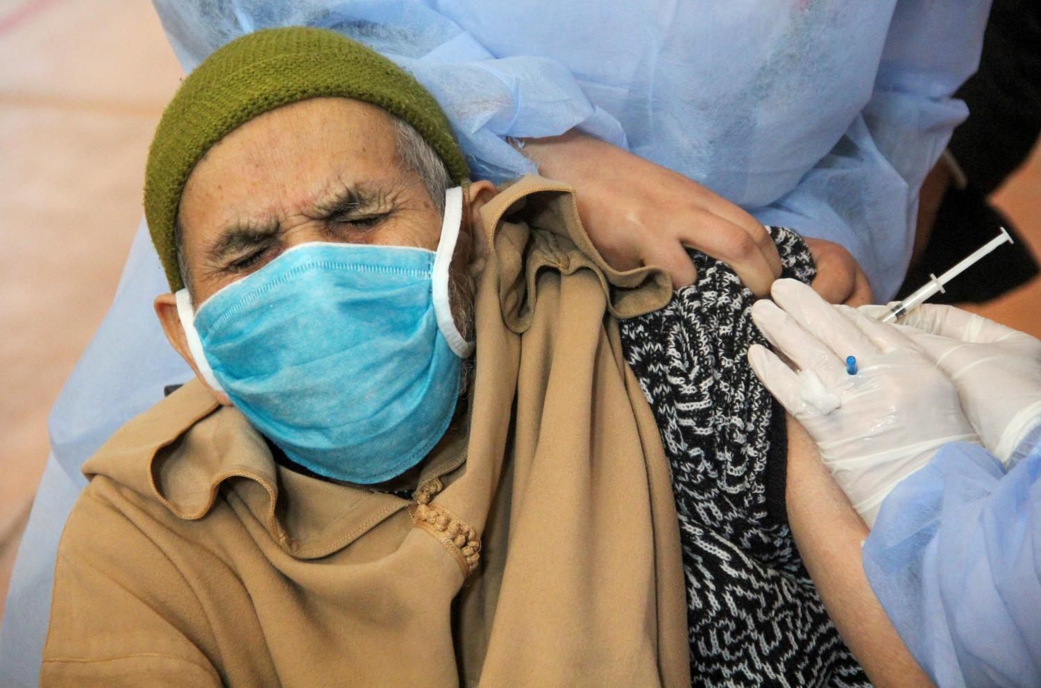 Man receives vaccine in Morocco. Source: Reuters