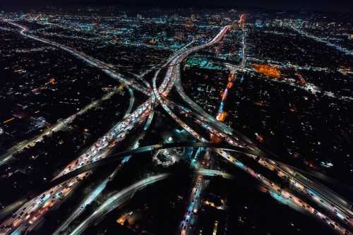 Aerial view of a massive highway in Los Angeles, CA at night
