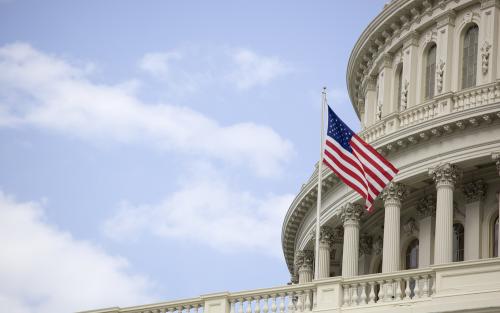 United States Capitol Building in Washington DC with American flag