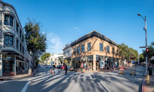 San Luis Obispo, USA - April 19, 2020: people enjoy a warm spring day in the old town of San Luis opisto at the main historic Monterey street.