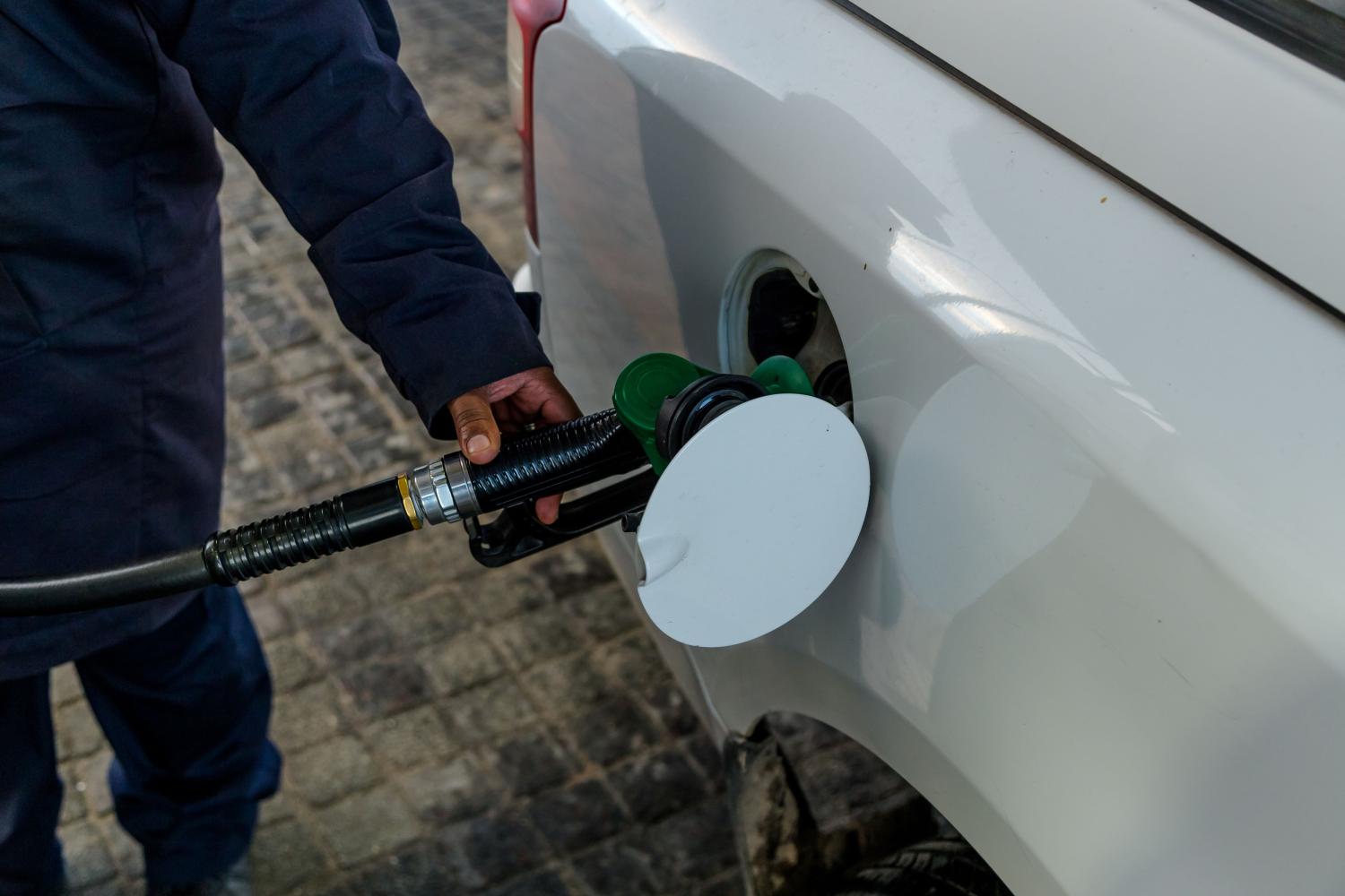 Cape Town, South Africa - August 2020: Car filling up gas at gas station in South Africa. Petrol station during fuel increase. Close up of Gas Pump. African Petrol Station.