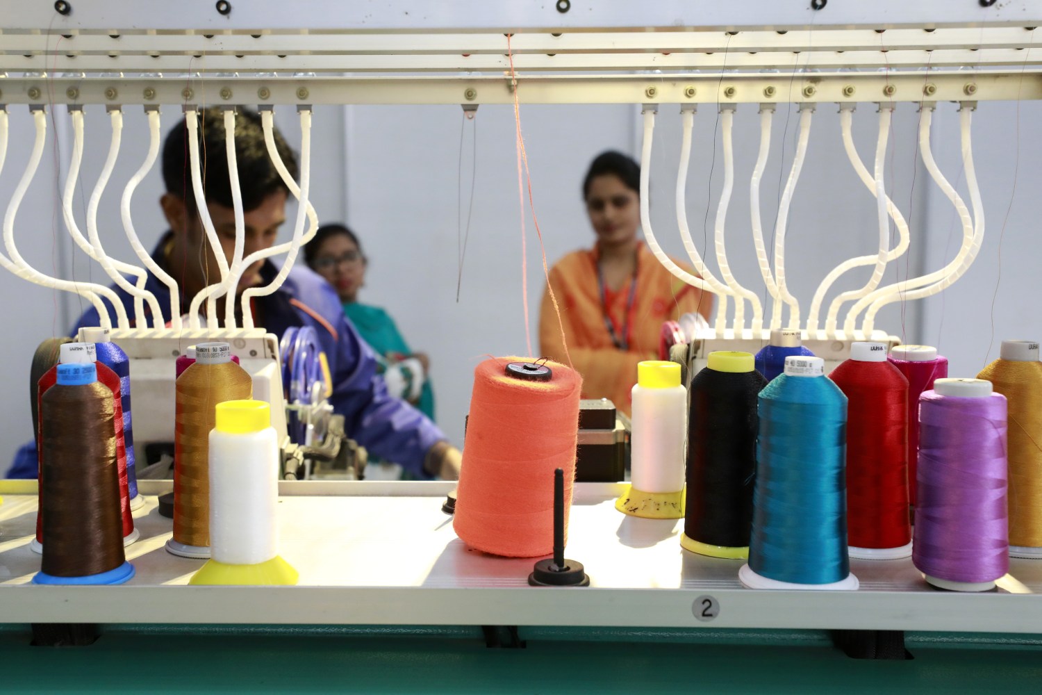 Dhaka, BANGLADESH - NOVEMBER 30, 2017: Readymade garments product buyers and sellers visit Bangladesh International Garments Textile Expo at Bashundhara International Convention City in Dhaka. S