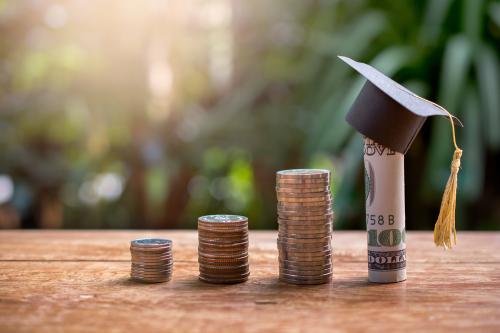 coins and graduation cap