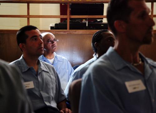 Inmates in the Last Mile program at San Quentin State Prison prepare to present their startup ideas in San Quentin, California February 22, 2013 . Seven San Quentin inmates presented startup proposals on “Demo Day” at the Last Mile program, an entrepreneurship course modeled on startup incubators that take in batches of young companies and provide them courses, informal advice and the seed investments to grow.  REUTERS/Gerry Shih  (UNITED STATES - Tags: CRIME LAW BUSINESS SOCIETY)