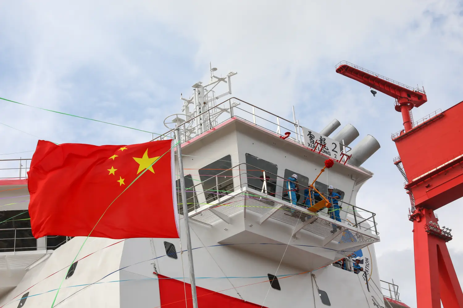 China's first domestically-built polar research vessel and icebreaker "Xuelong 2" prepares to take water at Jiangnan Shipyard in Chongming's Changxing Island in Shanghai, China, 10 September 2018.China's first wholly domestically conceived and built icebreaker Xuelong 2 took to the sea on Monday (10 September 2018) at Jiangnan Shipyard in Chongming's Changxing Island. Construction of the vessel began in December 20, 2016. Xuelong 2 will be put into service in the first half of 2019. It will team up with another icebreaker Xuelong on polar expeditions next year. The vessel is 122.5 meters in length and 22.3 meters wide, with a draught of 7.85 meters and displacement of 13,990 tons. It can reach 15 knots and it has a range of 20,000 nautical miles. Xuelong 2 can break 1.5-meter ice with a thick covering of snow at speeds of 2 to 3 knots. Its combines the requirements of a new-generation research vessel with environmental protection having an azimuthing electric propulsion system. Researchers can make observations of environmental elements like the ocean water, sea ice and polar air from the vessel and take samples from the marine environment in connection with climate change.No Use China. No Use France.