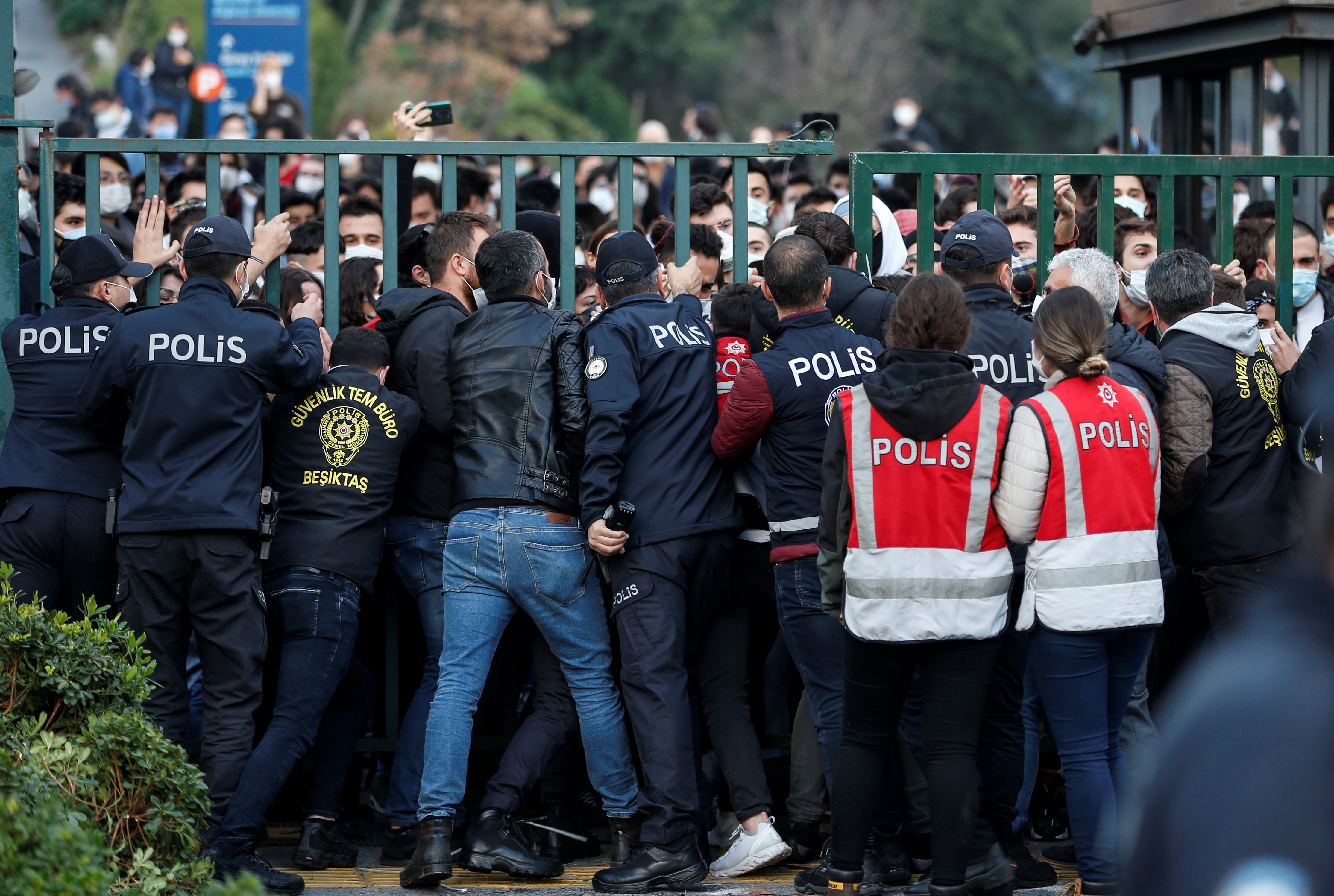 Turkish riot police blocks the main gate of Bogazici University to prevent students from leaving the campus as they protest against President Tayyip Erdogan's appointment of a new rector in Istanbul Turkey January 4, 2021. REUTERS/Kemal Aslan