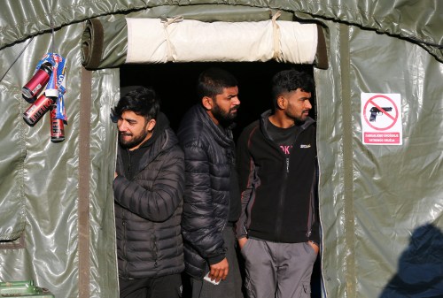 Migrants are seen in a migrant camp Lipa near Bihac, Bosnia and Herzegovina, February 18, 2021. REUTERS/Antonio Bronic