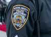 School safety police officer insignia seen during Mayor Bill de Blasio visit of Bronx Leaders of Tomorrow Richard R. Green Middle School in New York on februray 25, 2021 on reopening day during COVID-19 pandemic. About 100 students signed up to attend school for in-person learning. (Photo by Lev Radin/Sipa USA)No Use Germany.