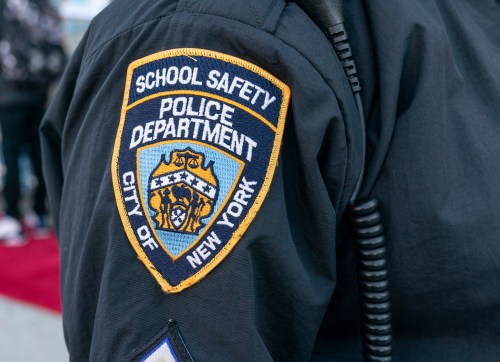 School safety police officer insignia seen during Mayor Bill de Blasio visit of Bronx Leaders of Tomorrow Richard R. Green Middle School in New York on februray 25, 2021 on reopening day during COVID-19 pandemic. About 100 students signed up to attend school for in-person learning. (Photo by Lev Radin/Sipa USA)No Use Germany.