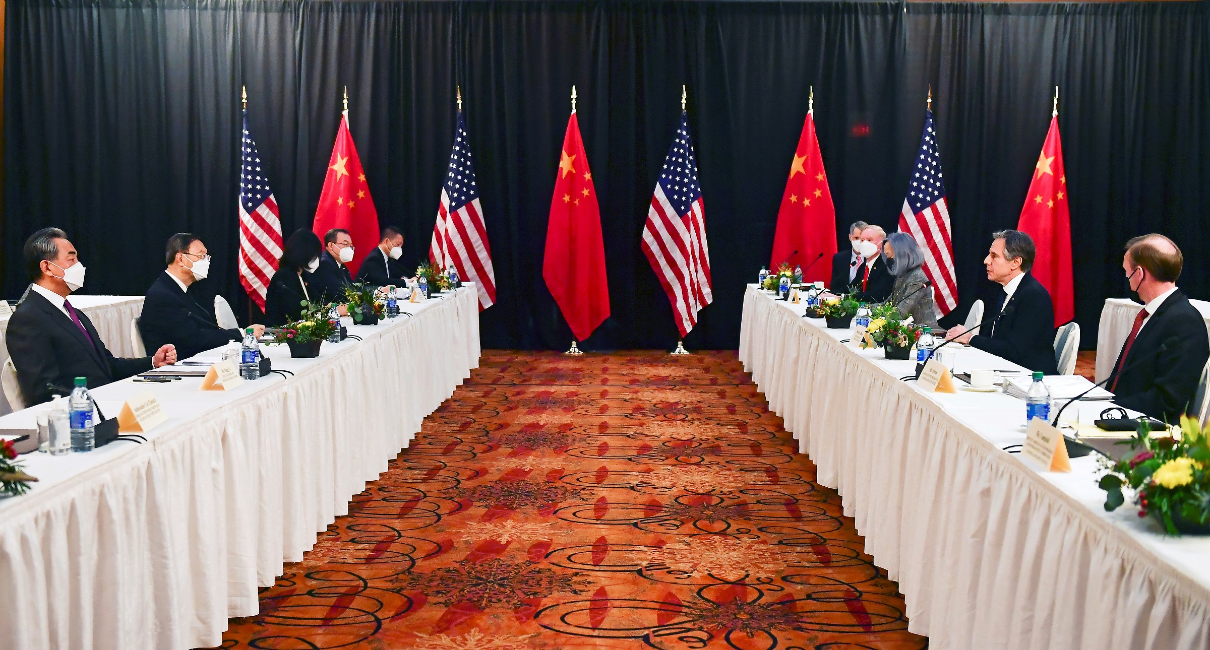 FILE PHOTO: U.S. Secretary of State Antony Blinken (2nd R), joined by National Security Advisor Jake Sullivan (R), speaks while facing Yang Jiechi (2nd L), director of the Central Foreign Affairs Commission Office, and Wang Yi (L), China's State Councilor and Foreign Minister, at the opening session of U.S.-China talks at the Captain Cook Hotel in Anchorage, Alaska, U.S. March 18, 2021. Frederic J. Brown/Pool via REUTERS/File Photo