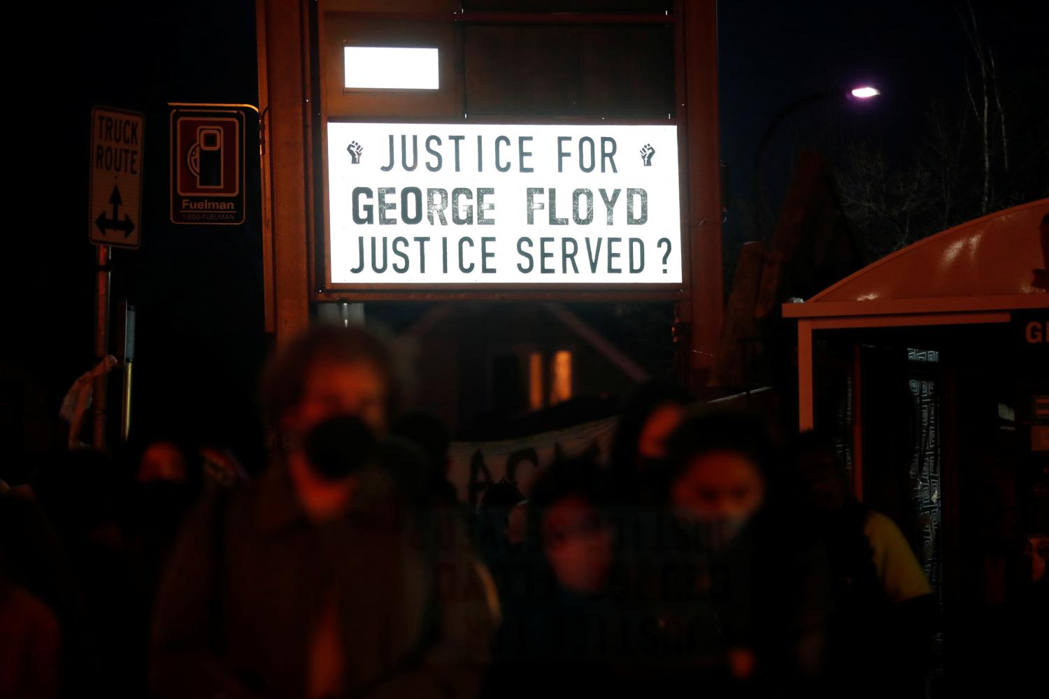 People react after the verdict in the trial of former Minneapolis police officer Derek Chauvin, found guilty of the death of George Floyd, at George Floyd Square in Minneapolis, Minnesota, U.S., April 20, 2021. REUTERS/Octavio Jones