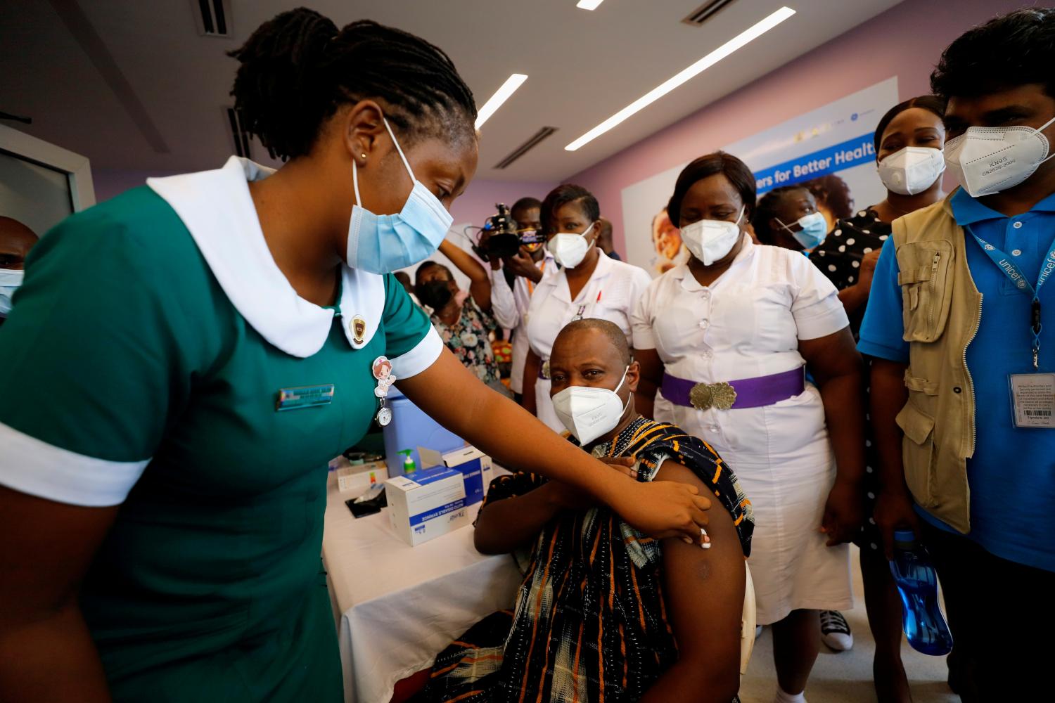 FILE PHOTO: Director General of the Ghana Health Service Dr. Patrick Kuma-Aboagye receives the coronavirus disease (COVID-19) vaccine during the vaccination campaign at the Ridge Hospital in Accra, Ghana March 2, 2021. REUTERS/Francis Kokoroko/File Photo