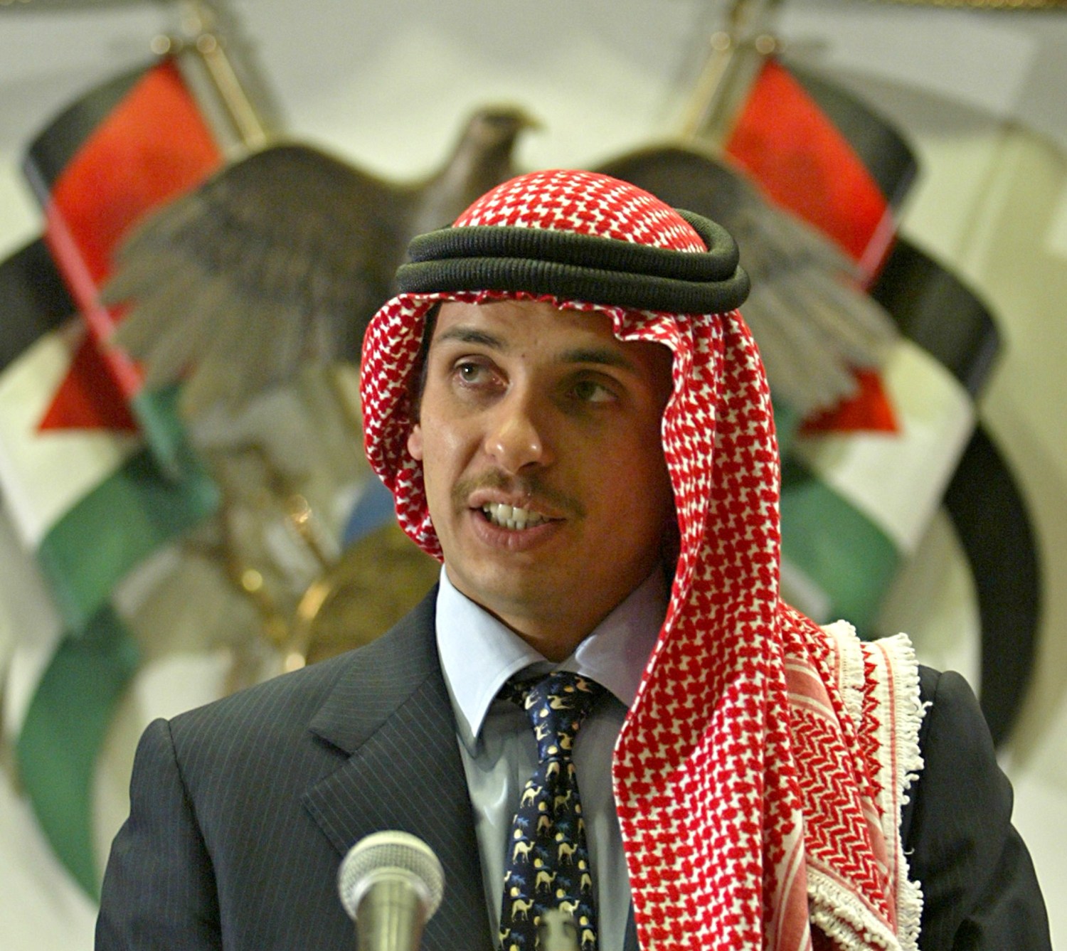 FILE PHOTO: Jordan's Crown Prince Hamza bin Hussein delivers a speech to Muslim clerics and scholars at the opening ceremony of a religious conference at the Islamic Al al-Bayet University in Amman, Jordan August 21, 2004. REUTERS/Ali Jarekji/File Photo