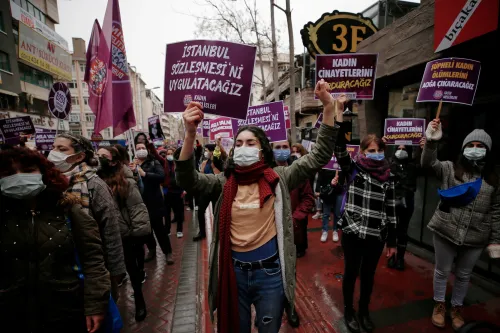 People participate in a protest against Turkey's withdrawal from Istanbul Convention, an international accord designed to protect women, in Ankara, Turkey March 20, 2021. REUTERS/Cagla Gurdogan