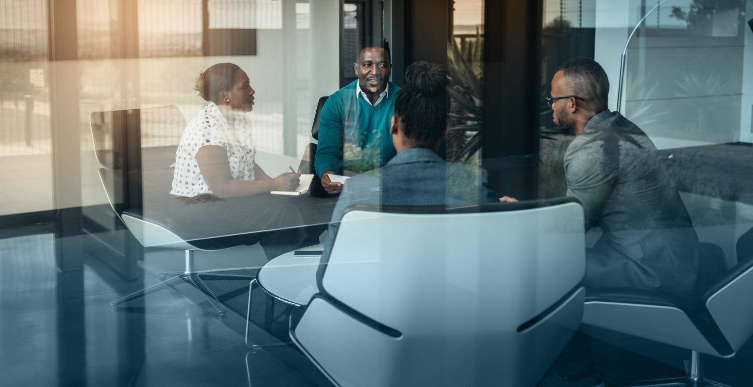 African business people holding a meeting