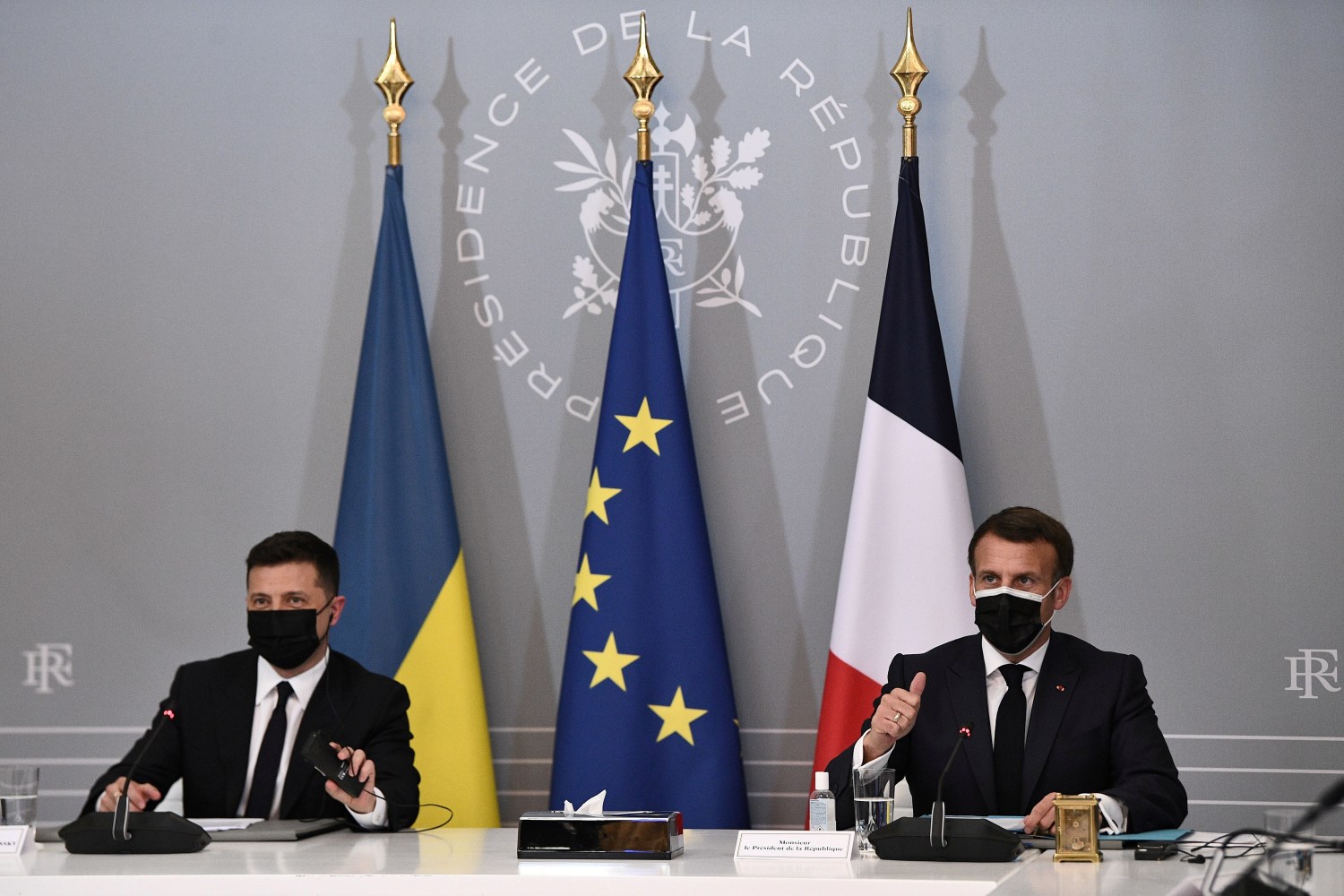 French President Emmanuel Macron and Ukrainian President Volodymyr Zelenskiy hold a news conference following their meeting at the Elysee Palace in Paris, France April 16, 2021. Anne-Christine Poujoulat/Pool via REUTERS