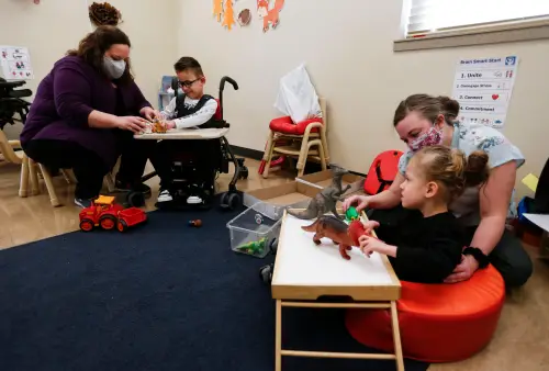 Republic Special Education teacher Stephanie Taylor (left) and paraprofessional Jessica Stever work with preschool students Rhett and Finley at the Republic School District Early Childhood Center on Wednesday, Jan. 13, 2021.Trepublic00024
