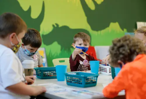 A group of kids in the Little Explorers Club, a preschool class for kids aged three to five years old, including Samuel Campbell, paint a bird scene during arts and crafts time in the Suzie Edwards Conservation Education Classrooms at the Columbus Zoo and Aquarium on Thursday, April 22, 2021.Columbus Zoo Little Explorers
