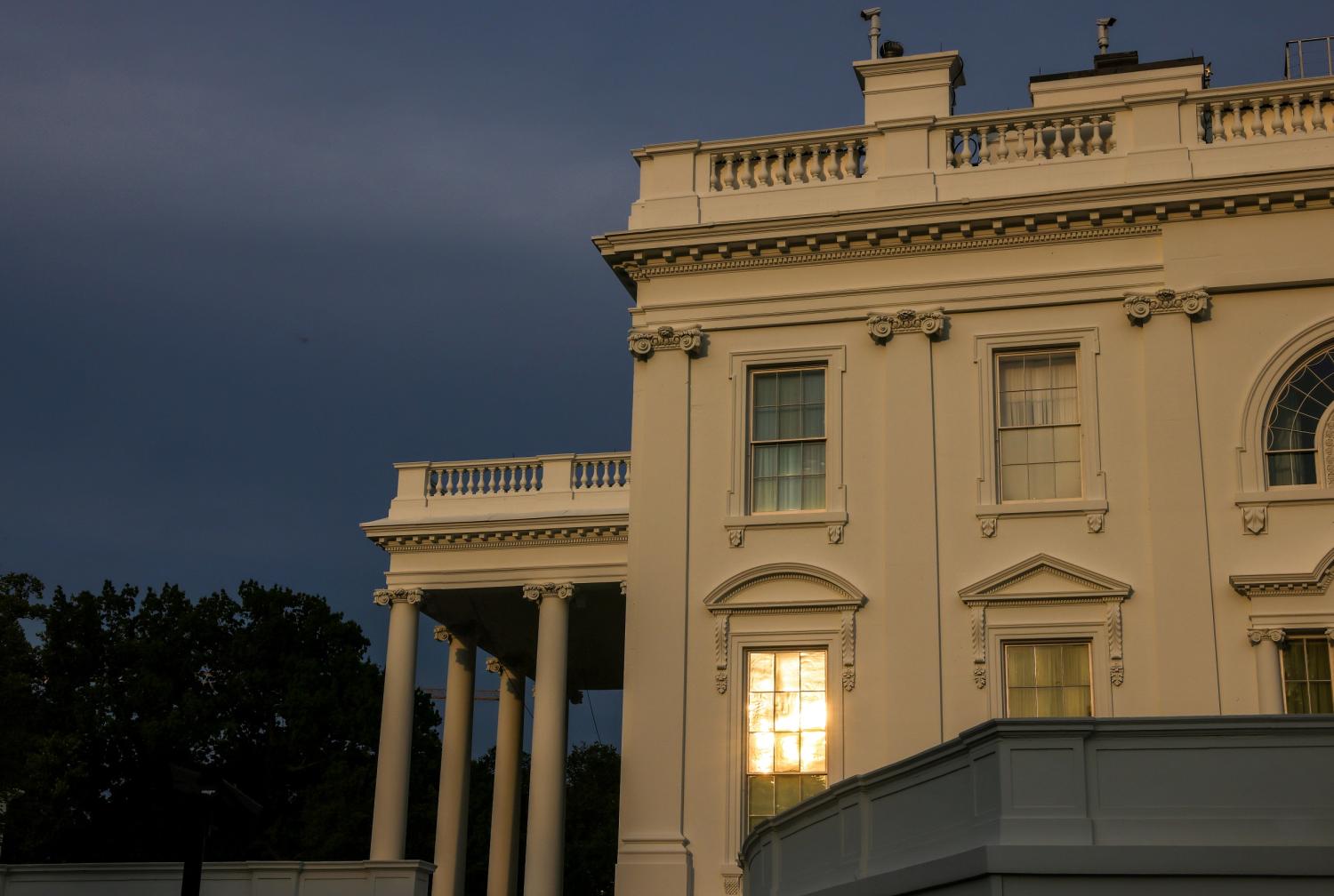 The sun reflects off the White House before President Joe Biden's speech before the Joint Session of Congress in Washington, U.S., April 28, 2021. REUTERS/Evelyn Hockstein     TPX IMAGES OF THE DAY