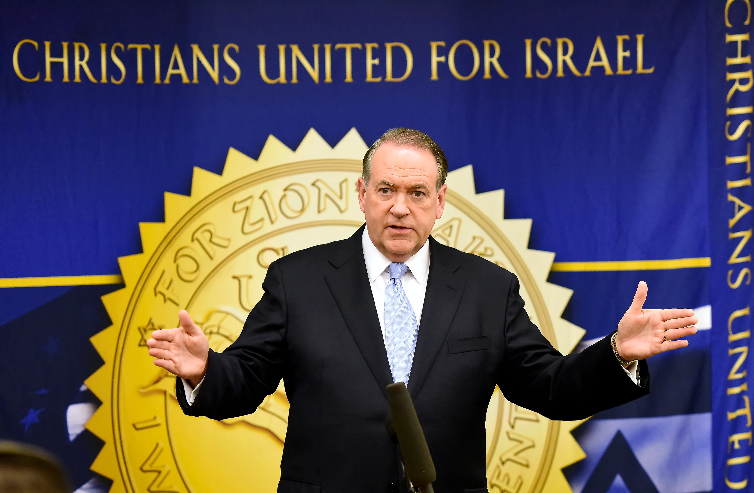 Former Governor Mike Huckabee (Republican of Arkansas), a candidate for the 2016 Republican nomination for President of the United States, shares his thoughts on Israel and the Middle East at the 2015 Christians United For Israel Summit Candidates Forum at the Washington Convention Center in Washington, DC, USA, on Monday, July 13, 2015. Photo by Ron Sachs/CNP/ABACAPRESS.COM