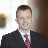 A man in a dark suit