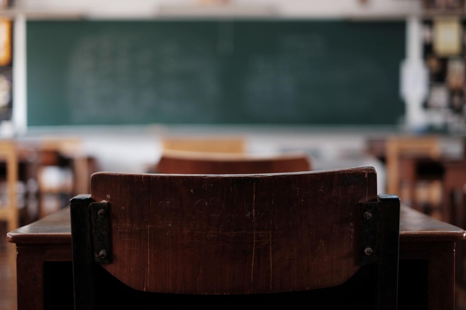 View from an old wooden desk in a classroom