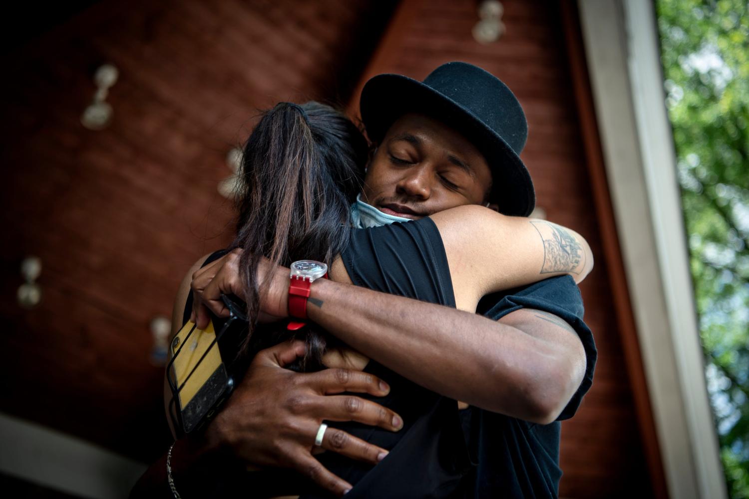Isaiah Stratton, 24 of East Rutherford hugs Jasmyne Mena, 23 of Rutherford, organizer of a Black Lives Matter march and rally held in Rutherford in response to the killing of George Floyd and other Black Americans. Stratton spoke during the rally at Lincoln Park on Sunday, June 7, 2020.News George Floyd Black Lives Matter