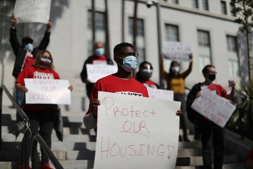 People protest for the Los Angeles City Council to vote against adding more short-term rental units, and call for more affordable housing, as the global outbreak of the coronavirus disease (COVID-19) continues, in Los Angeles, California, U.S., November 12, 2020. REUTERS/Lucy Nicholson