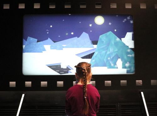 MOSCOW, RUSSIA - FEBRUARY 24, 2021: A girl watches a cartoon at the Soyuzmultpark multimedia entertainment centre opened at the VDNKh Exhibition Centre. The facility offers 18 interactive installations taking up 1,700sqm, with the building's total area of 2,500sqm. Gavriil Grigorov/TASS.No use Russia.