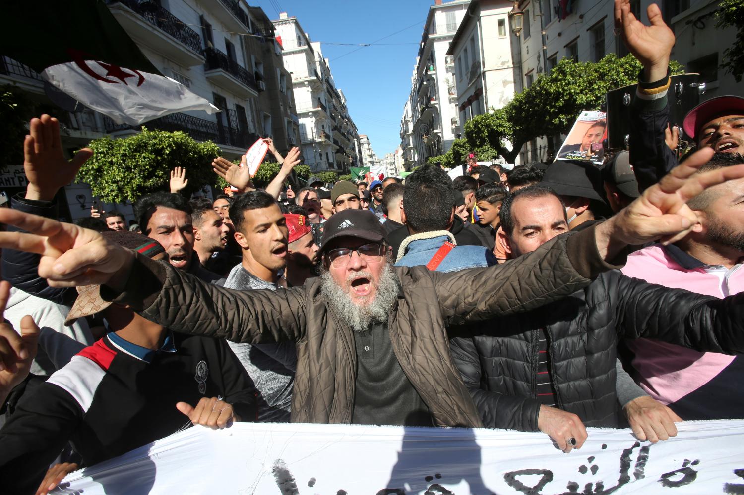 A demonstrator gestures during a protest demanding political change, in Algiers, Algeria March 12, 2021. REUTERS/Ramzi Boudina     TPX IMAGES OF THE DAY