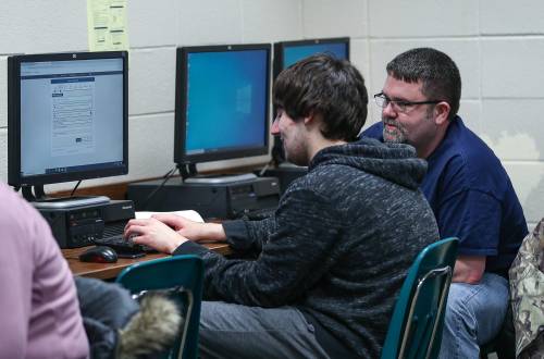 Students and families complete FAFSA forms online during an assistance event at Greenwood Community High School on Wednesday, Feb. 26, 2020.Invested Indiana Fafsa College Preparation Workshop At Greenwood Community High School In Greenwood Ind On Wednesday Feb 26 2020