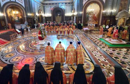 MOSCOW, RUSSIA - MAY 6, 2021: Orthodox priests perform a Holy Liturgy at the Cathedral of Christ the Saviour to mark the feast days of St George the Great Martyr and Our Lady of Iveron as well as the upcoming 76th anniversary of the victory in World War II. Vyacheslav Prokofyev/TASS.No use Russia.