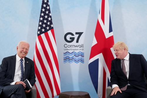 U.S. President Joe Biden laughs while speaking with Britain's Prime Minister Boris Johnson during their meeting, ahead of the G7 summit, at Carbis Bay, Cornwall, Britain June 10, 2021REUTERS/Kevin Lamarque     TPX IMAGES OF THE DAY