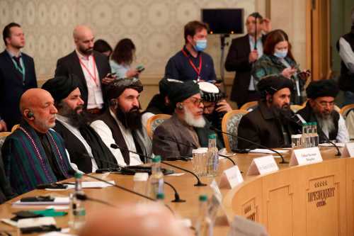 Officials, including Afghan former President Hamid Karzai and the Taliban's deputy leader and negotiator Mullah Abdul Ghani Baradar, attend the Afghan peace conference in Moscow, Russia March 18, 2021. Alexander Zemlianichenko/Pool via REUTERS