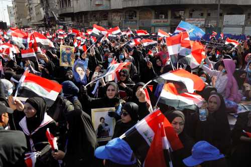 Supporters of Ammar al-Hakim, Leader of Hikma movement gather during Iraqi Martyrs' day rally in Baghdad, Iraq February 12, 2021. REUTERS/Khalid al-Mousily