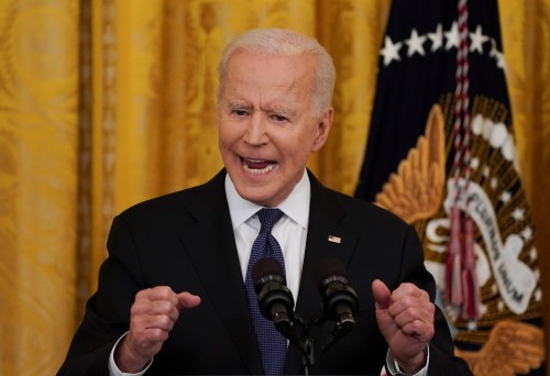 FILE PHOTO: U.S. President Joe Biden gestures as he speaks before signing the COVID-19 Hate Crimes Act into law, in the East Room at the White House in Washington, U.S., May 20, 2021. REUTERS/Kevin Lamarque/File Photo
